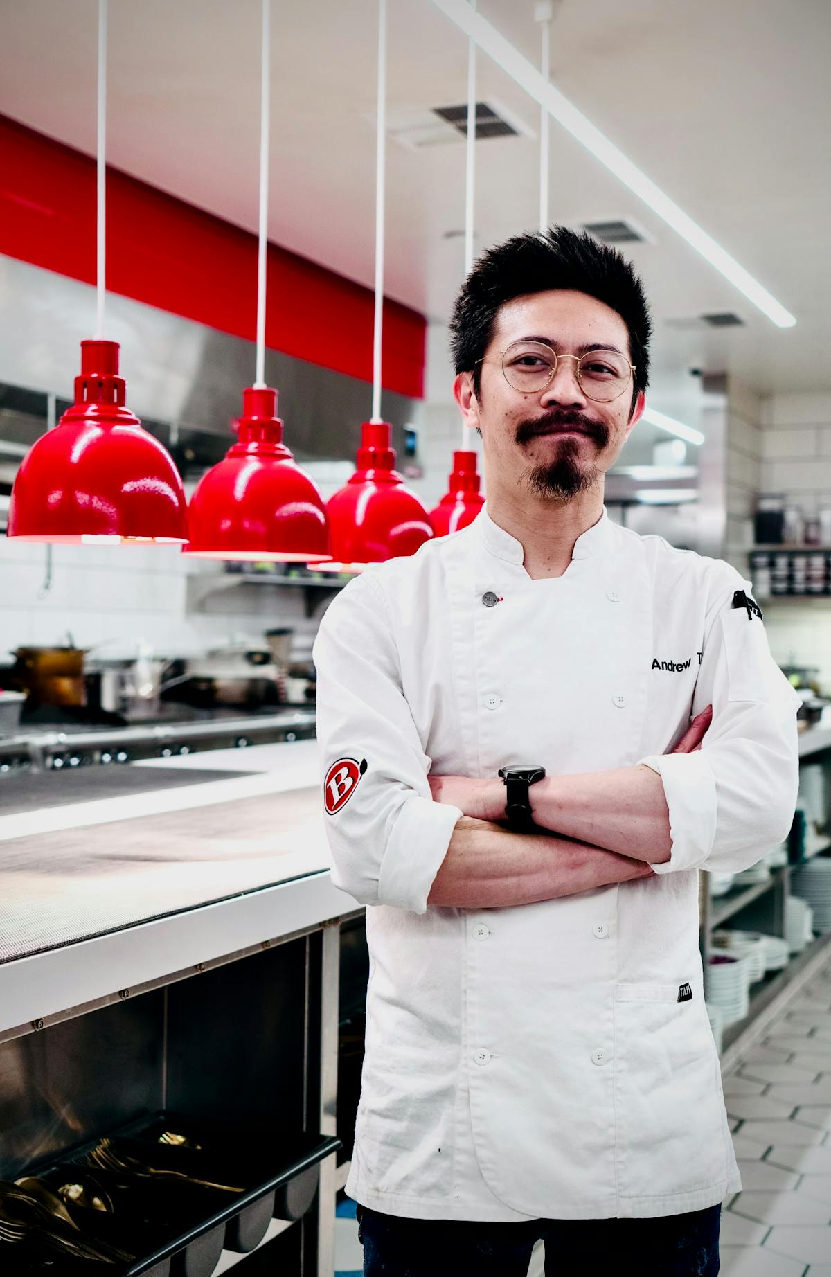 a man standing in a kitchen