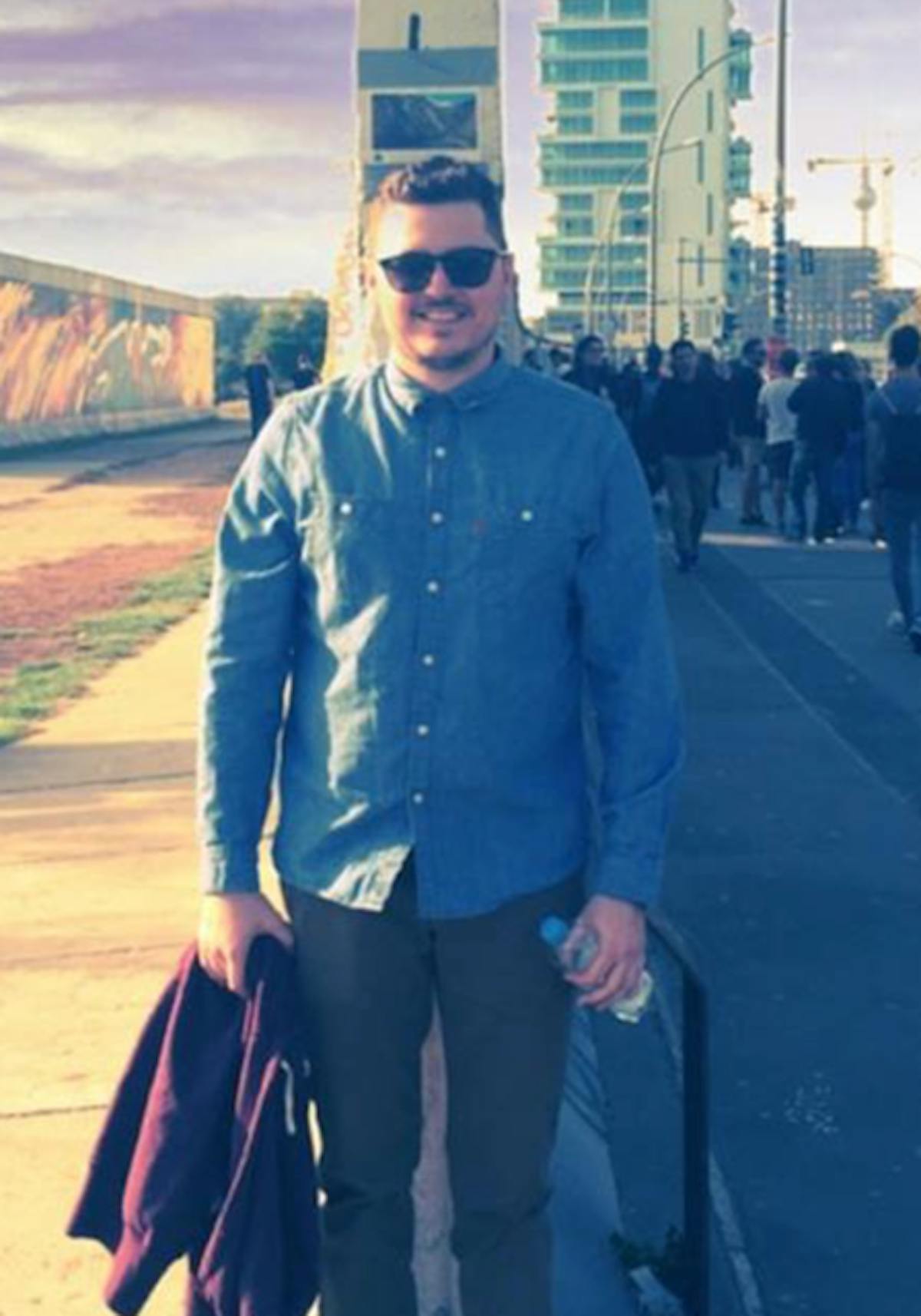 a person standing posing for the camera