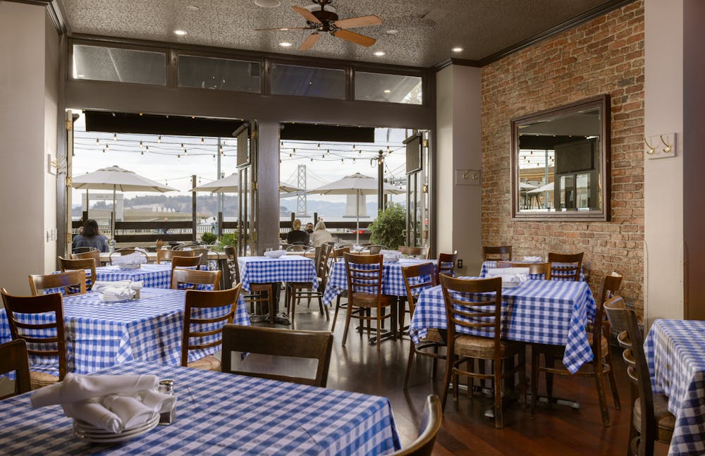 a room filled with furniture and a large window