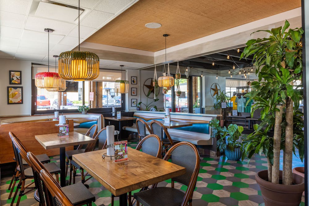 a dining room table in front of a building