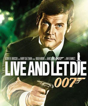 Roger Moore wearing a suit and tie