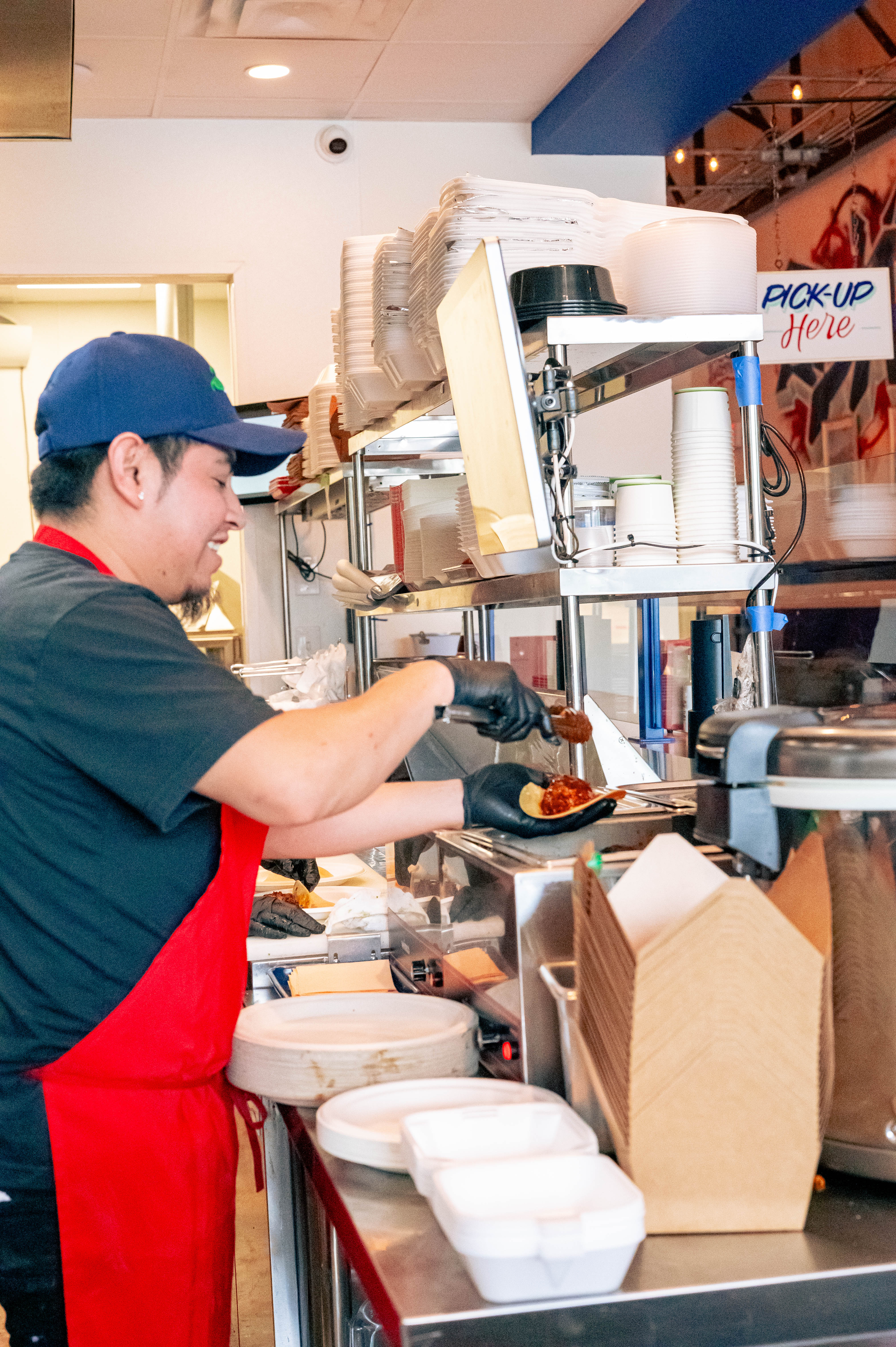 a man preparing food in a kitchen