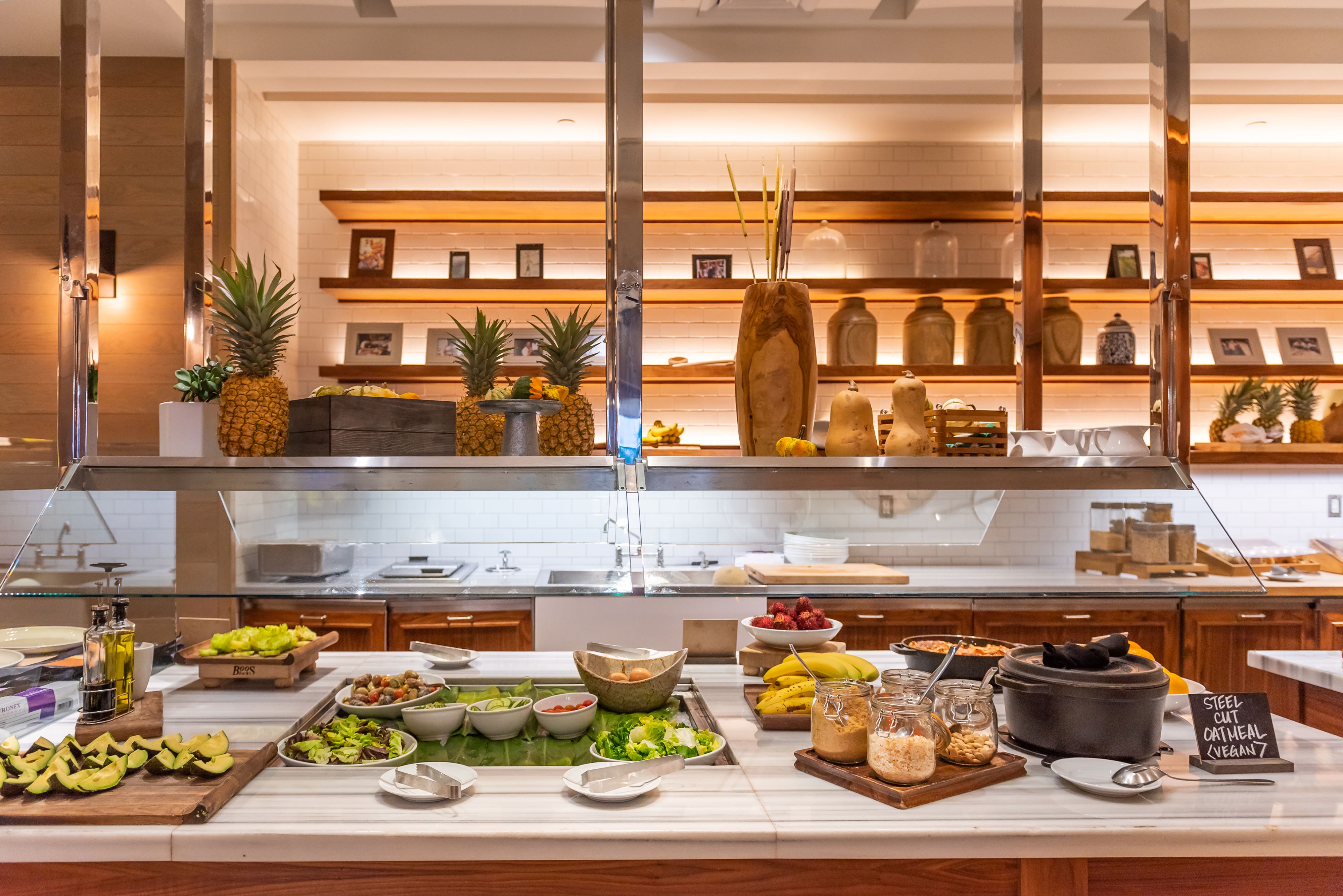 a kitchen with a plate of food on a table
