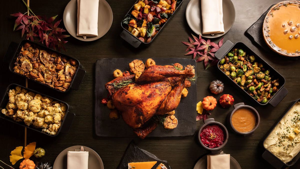 a table full of thanksgiving meal fixings