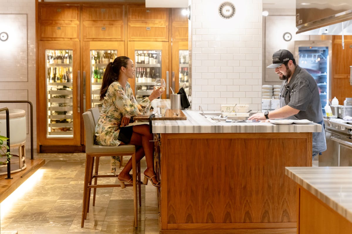 a person cooking in a kitchen