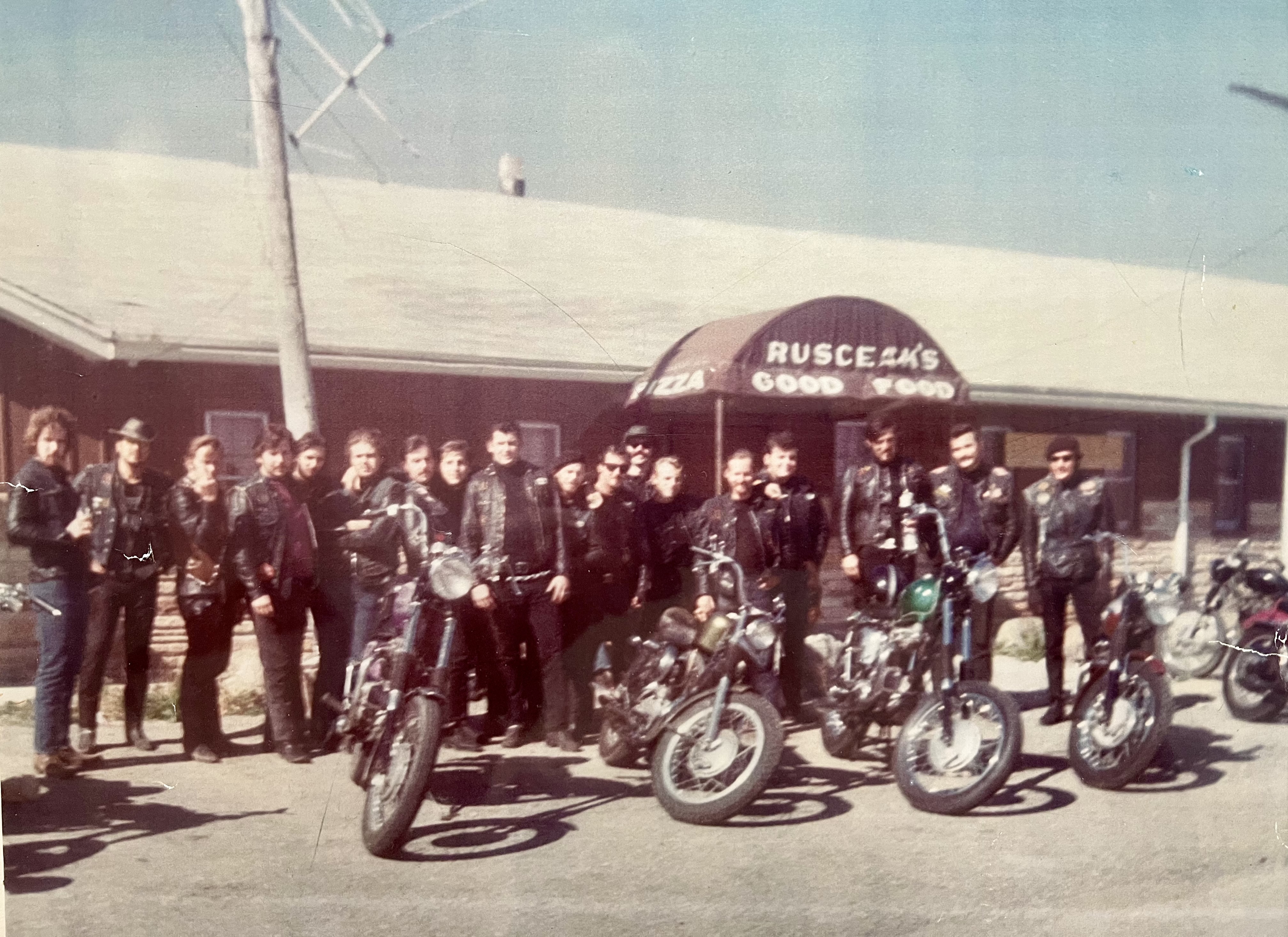 A biker group outside front door