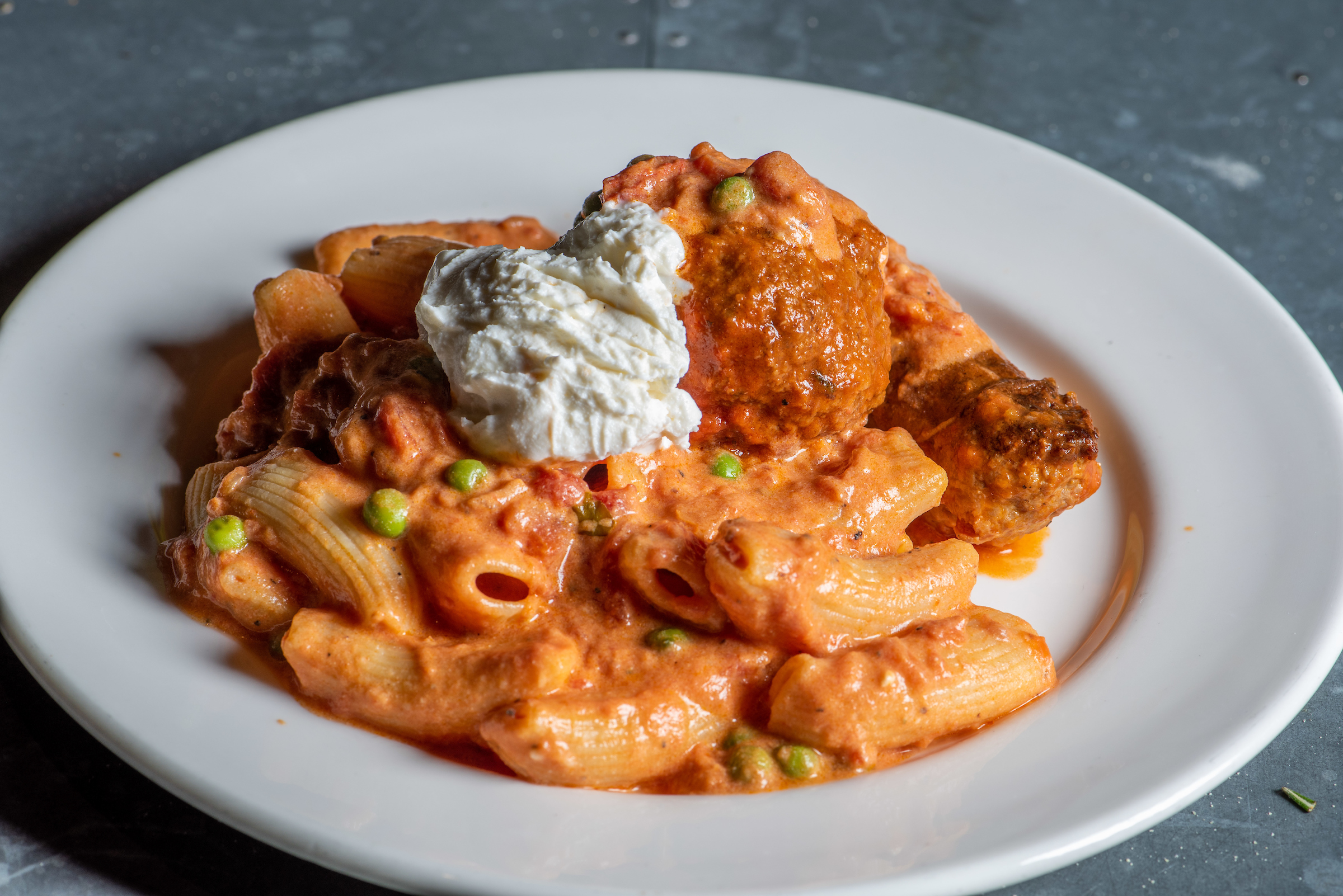 A picture of pasta with meat and cheese