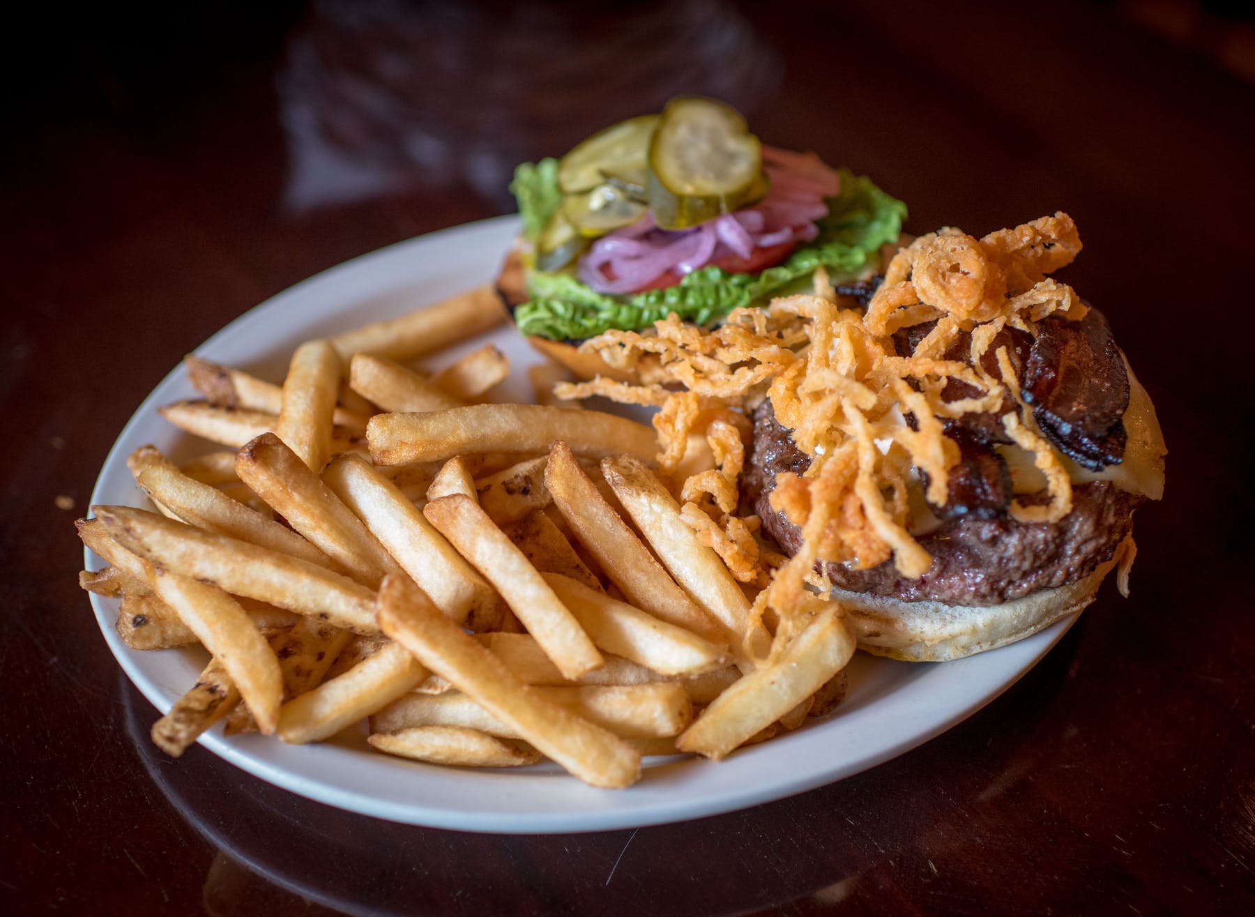 a close up of a plate of fries