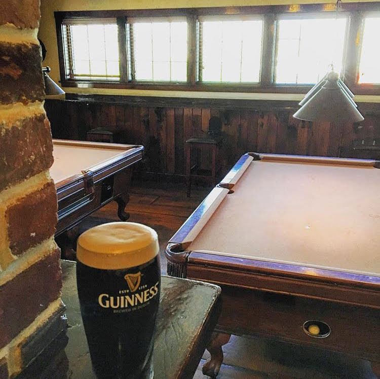a glass of beer on a table