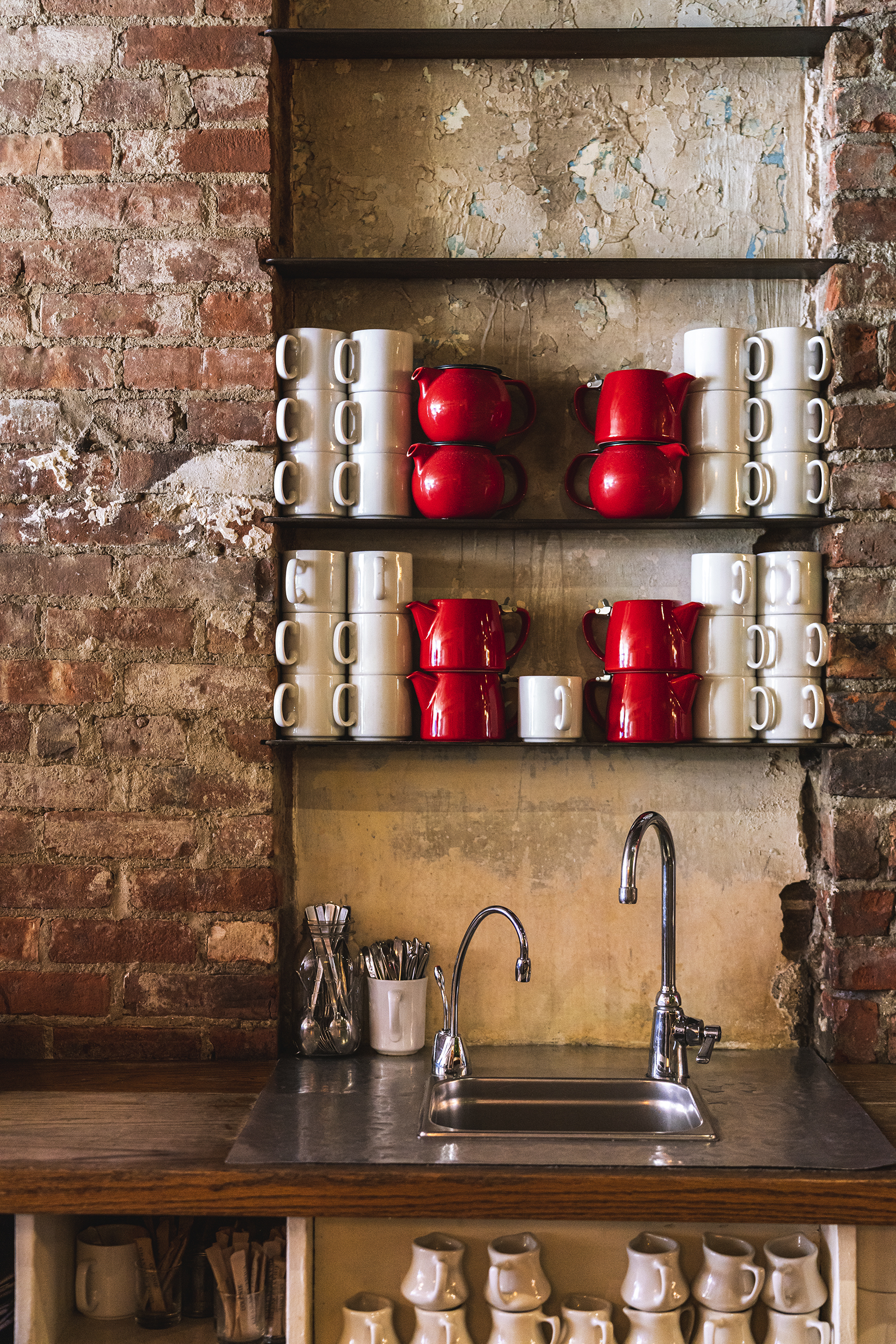 a stove top oven sitting inside of a building