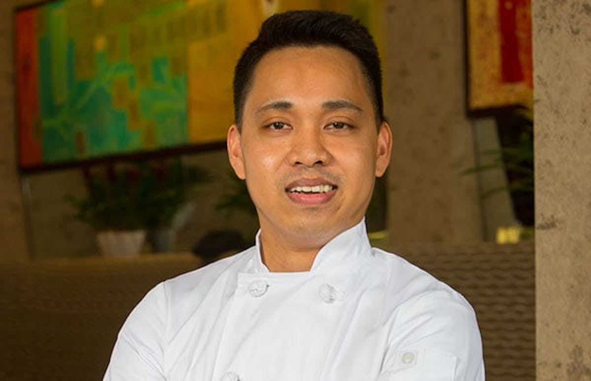 a man smiling for the camera