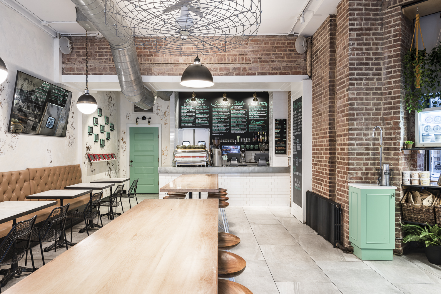 a room that has a bench in front of a building