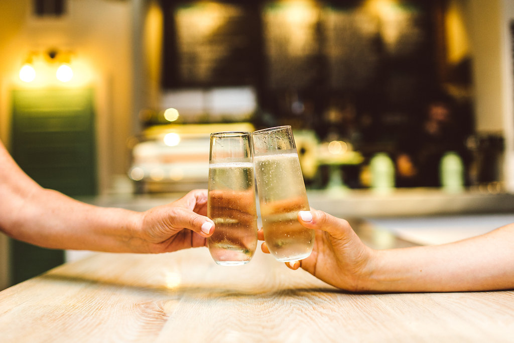 a close up of a person sitting on a table