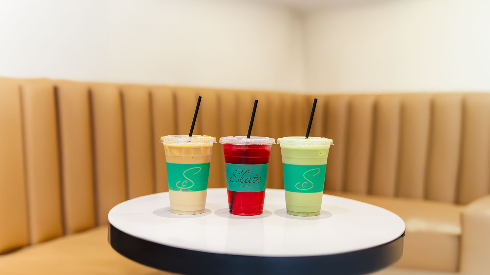 a cup of smoothie on a table 