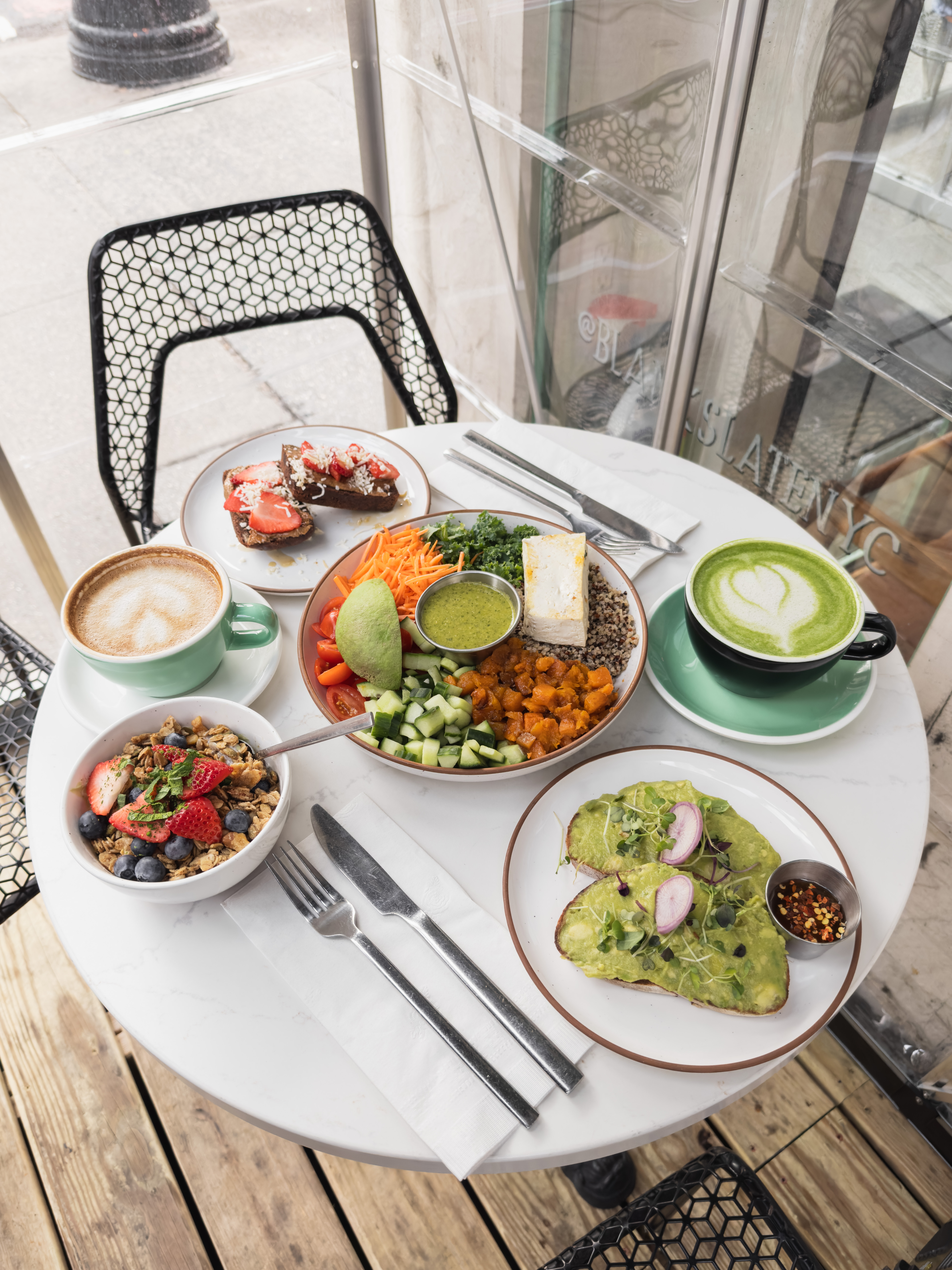 a table topped with plates of food on a plate