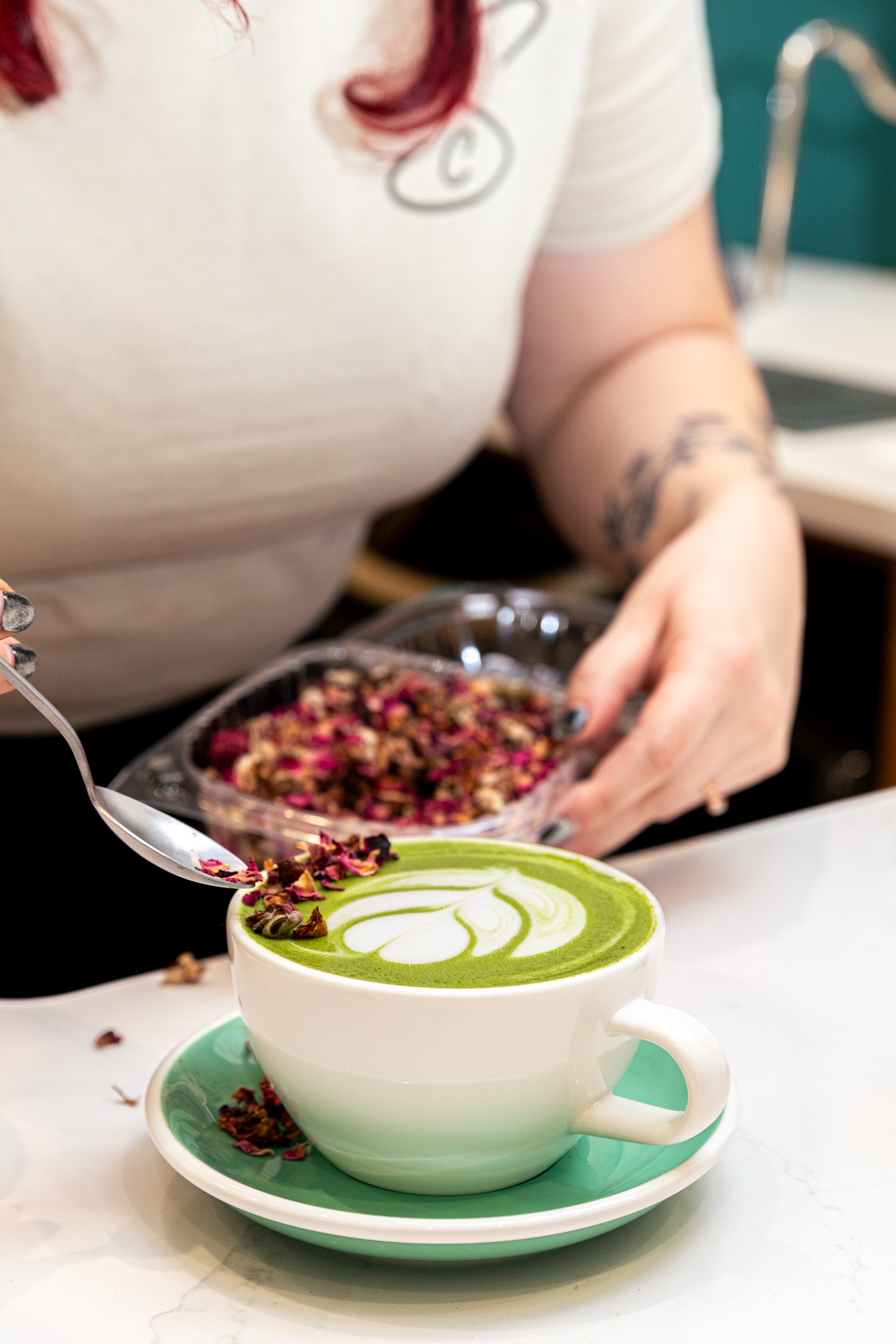 a person standing in front of a plate of food
