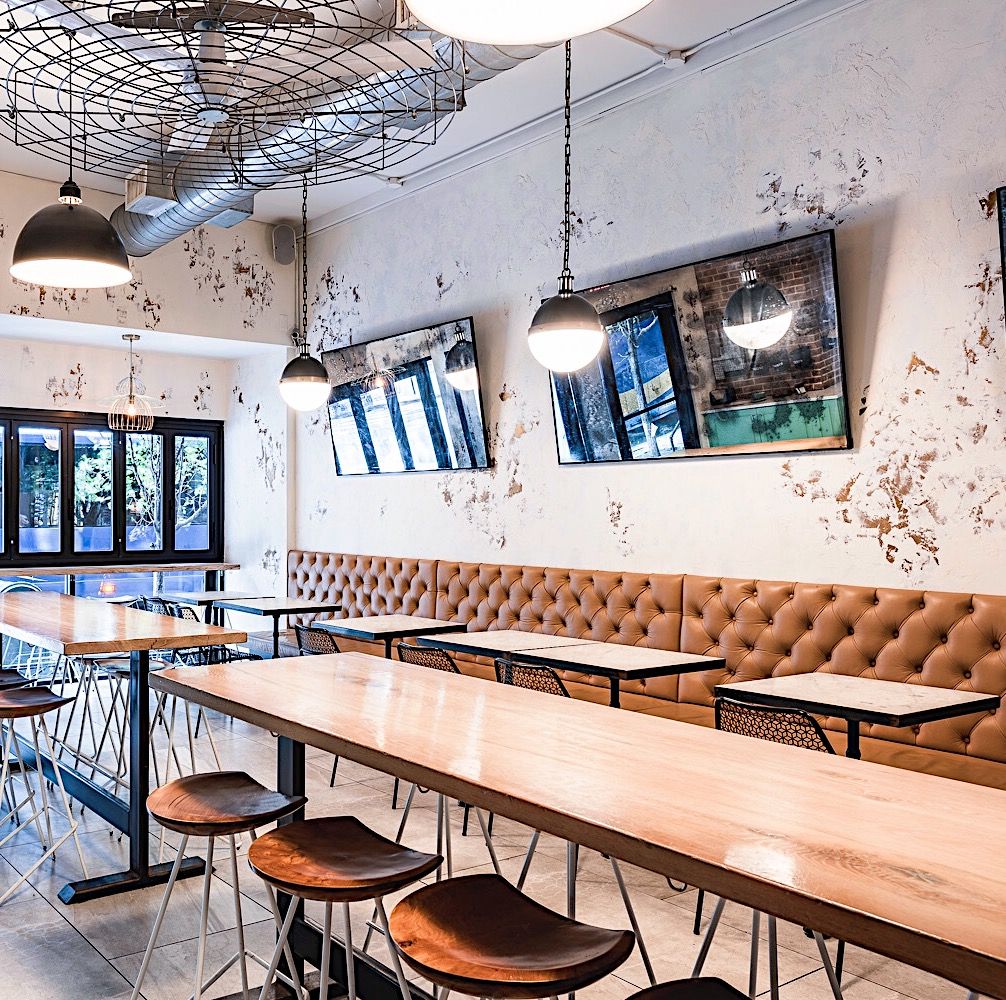 a chair sitting in front of a building