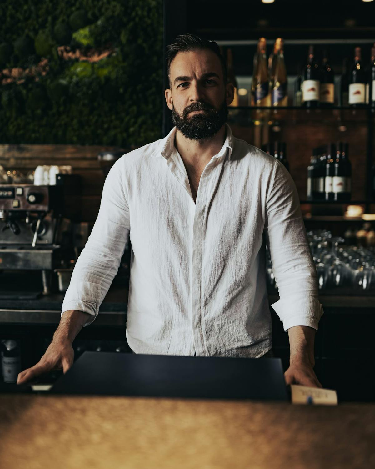 a man standing in a kitchen