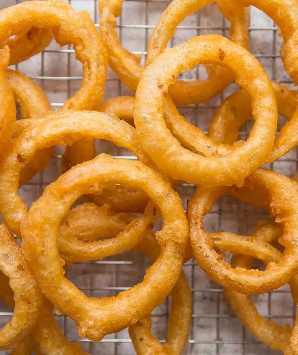 a close up of a pile of fries