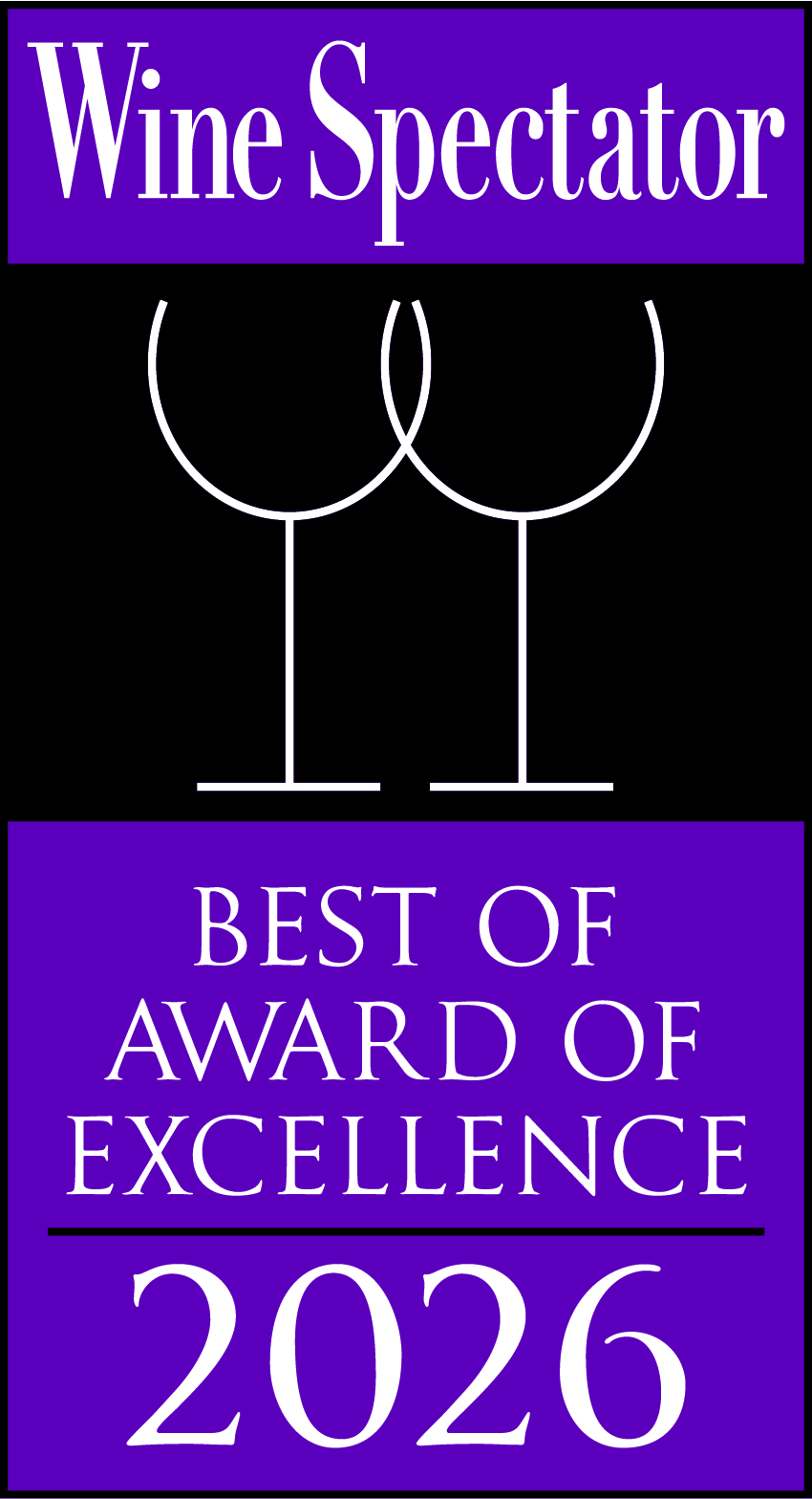 a black and white sign with two wine glasses