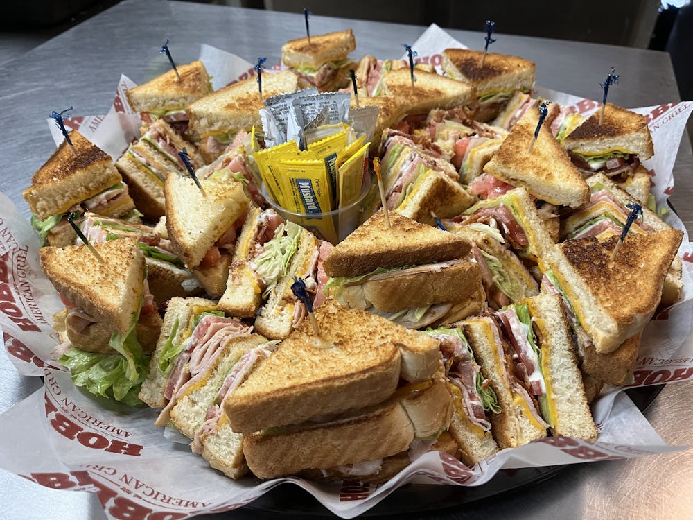 a sandwich cut in half on a plate