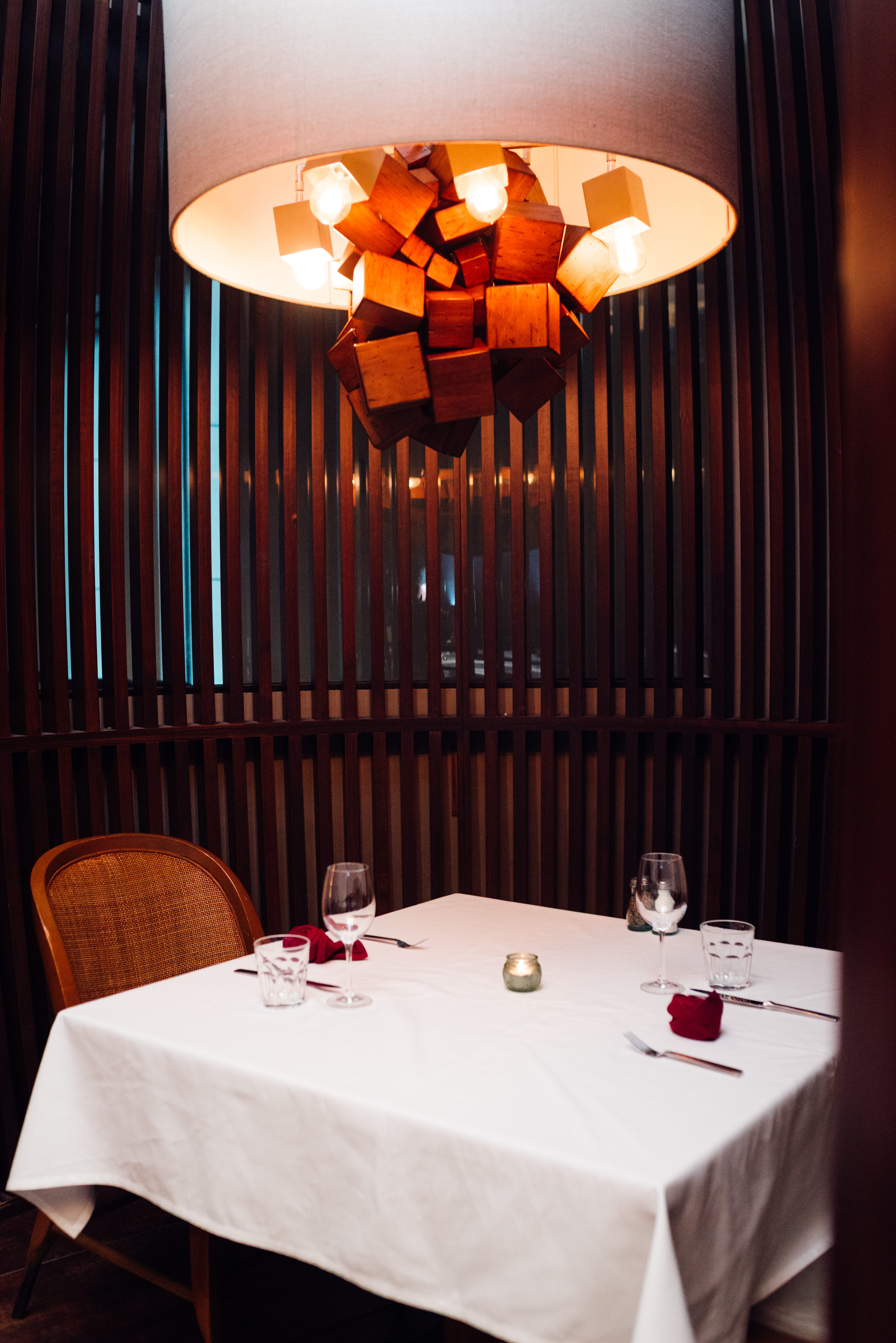 a chandelier over a table