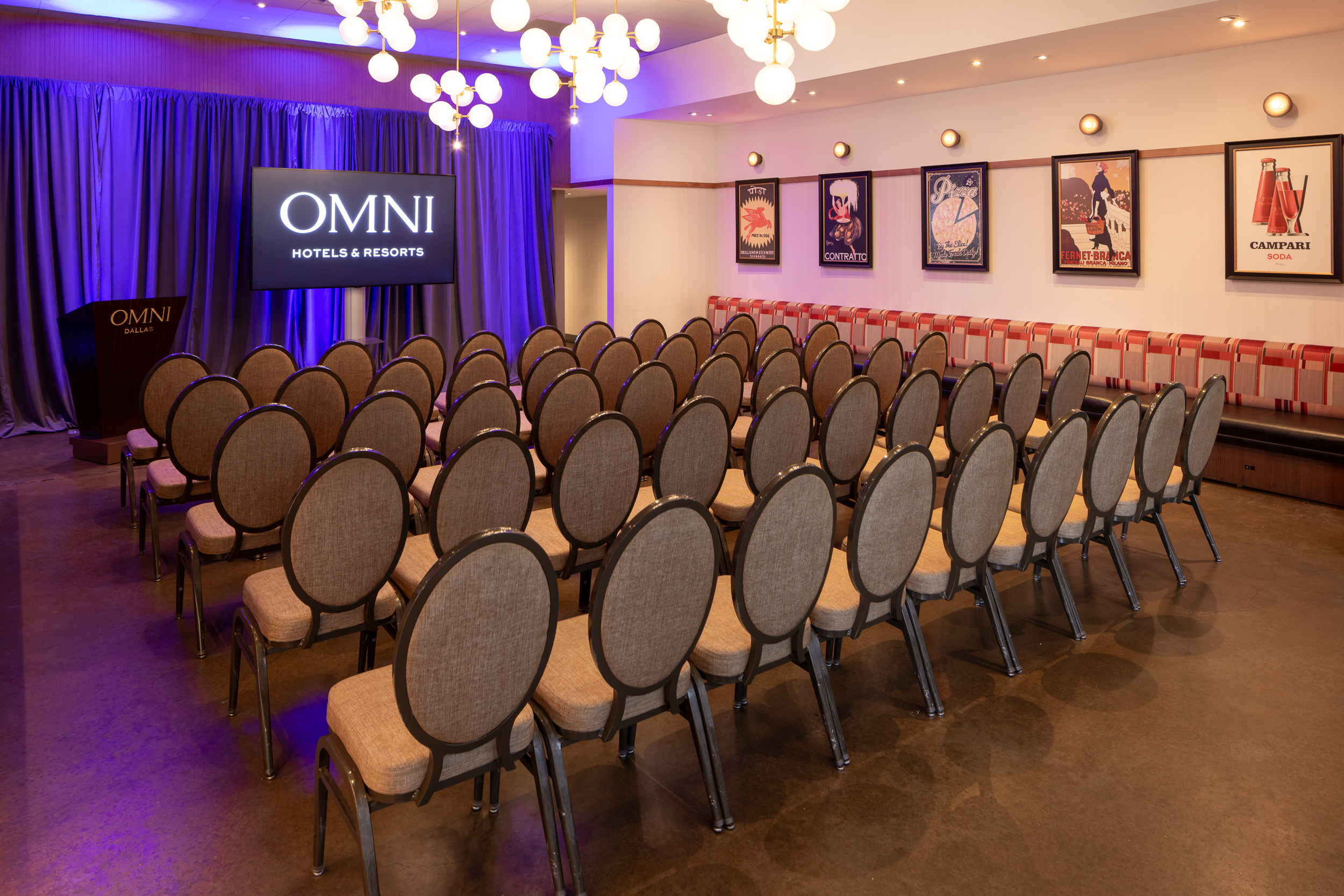 a room with rows of chairs