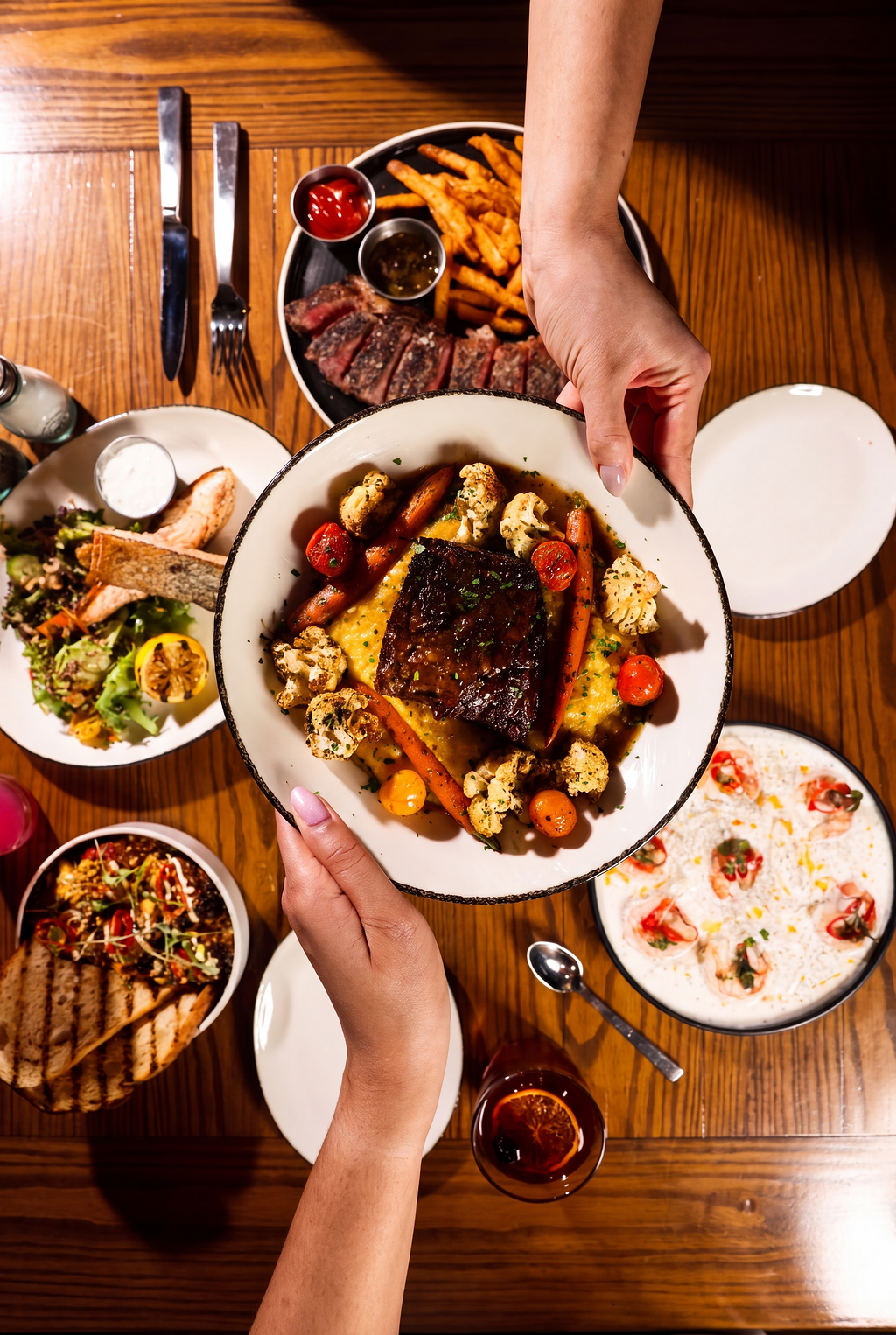 a person holding a plate of food