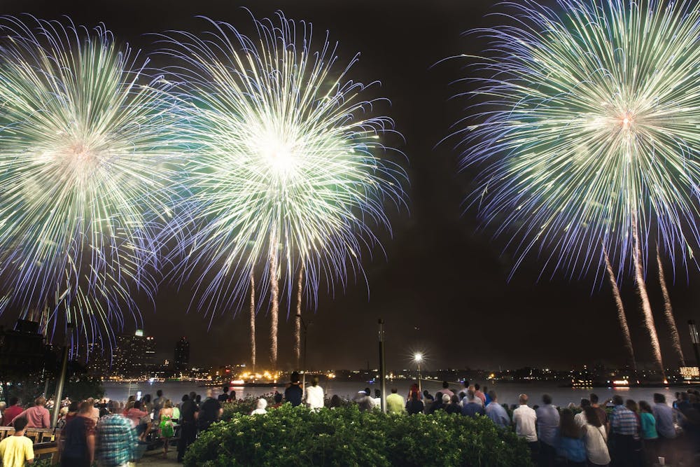 a group of fireworks in the night sky