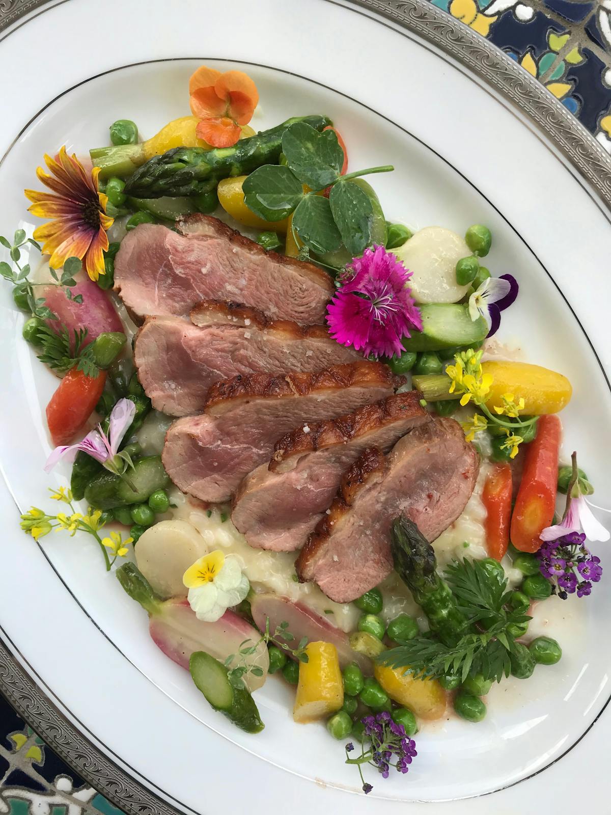 Duck break with spring veggies and risotto