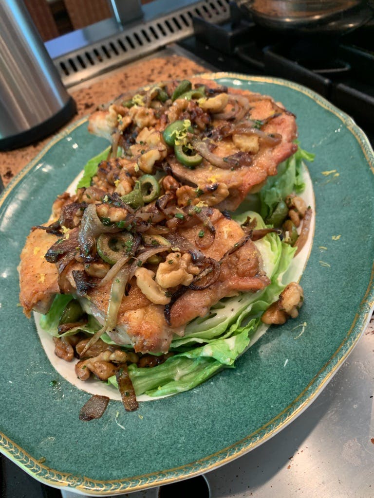 Crispy Chicken Thighs with Green Olives, Walnuts & Caramelized Onions