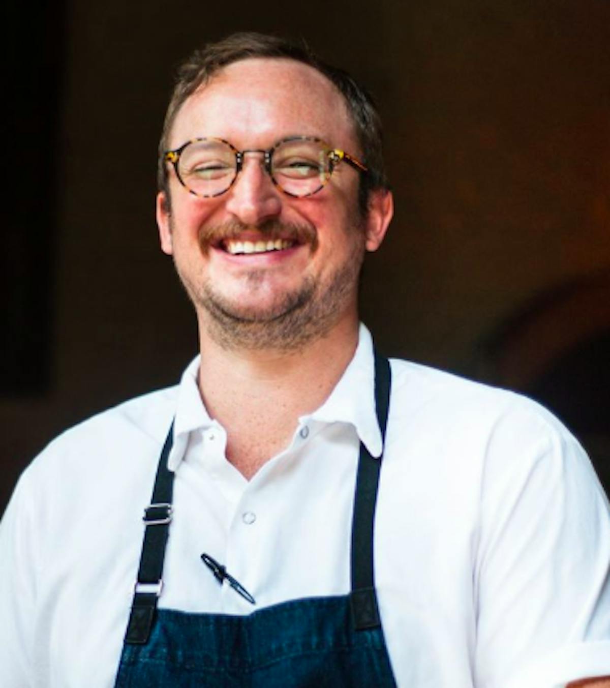 a man smiling for the camera