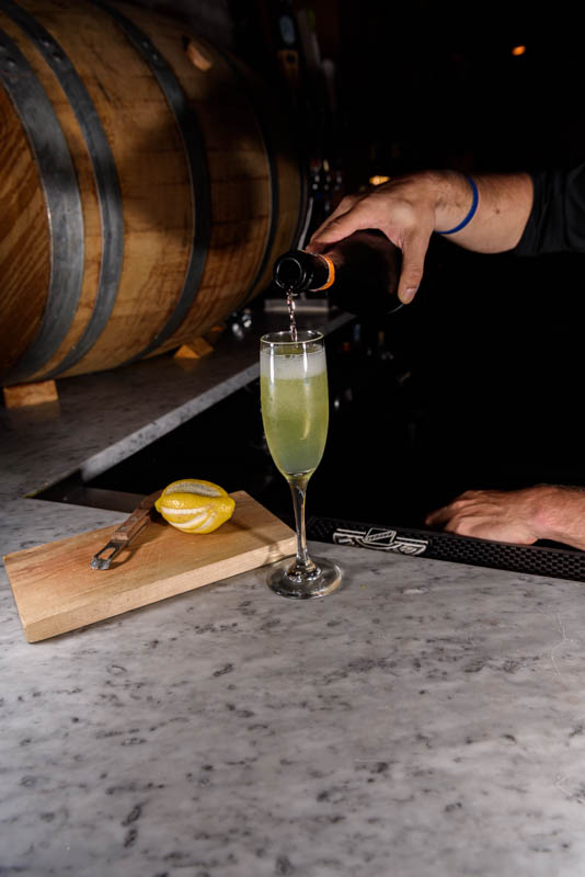 a barrel holding a glass of wine