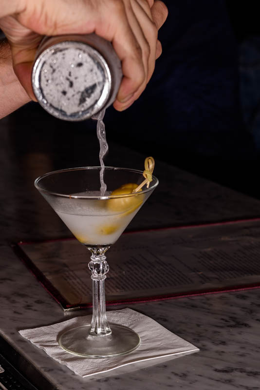 a person holding a wine glass