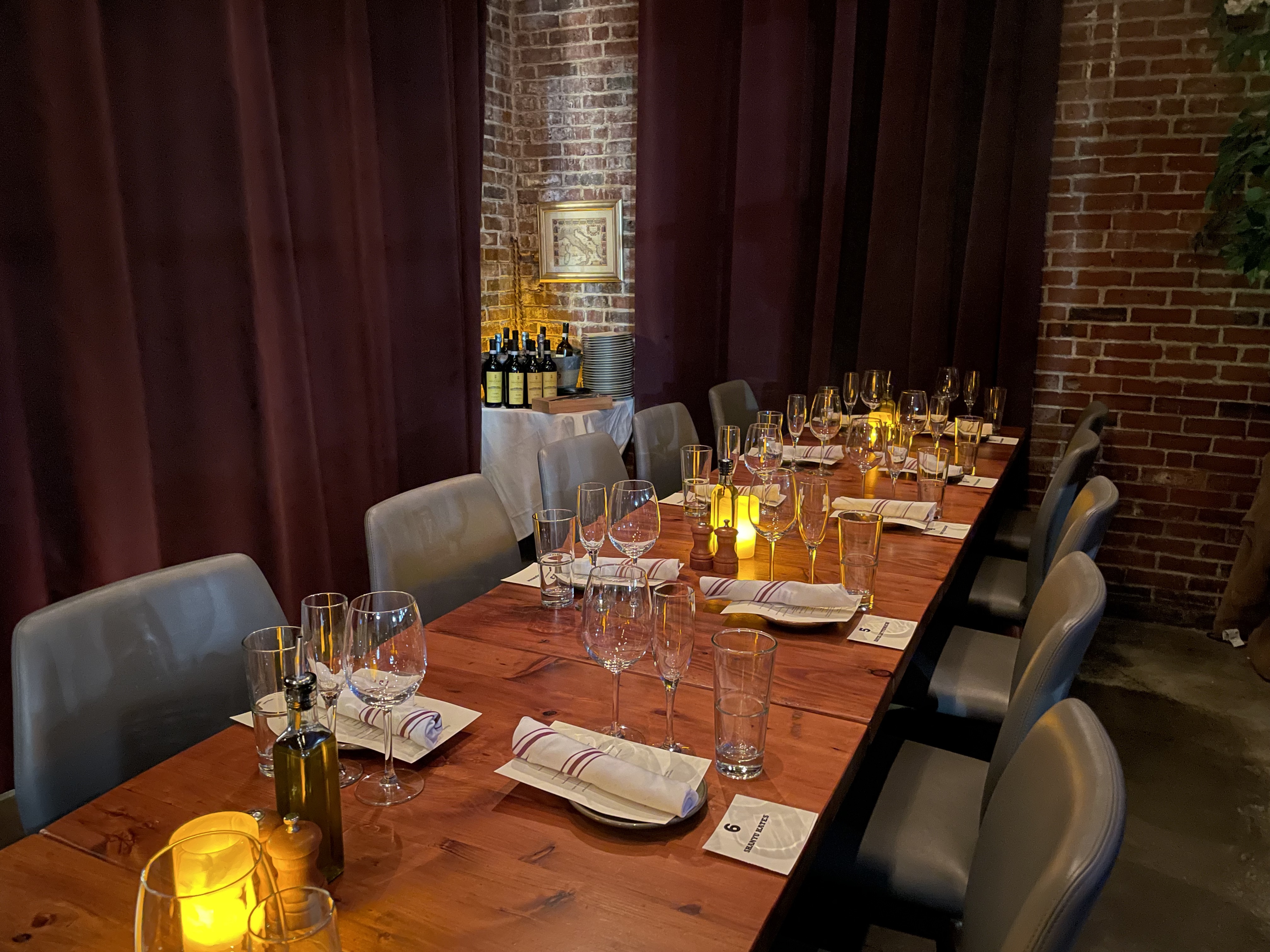 a dining table with wine glasses