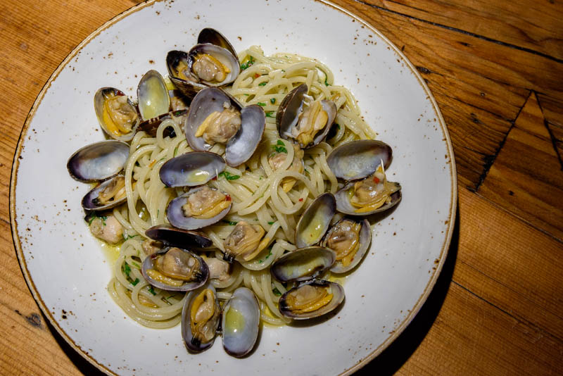 a plate of food on a wooden table