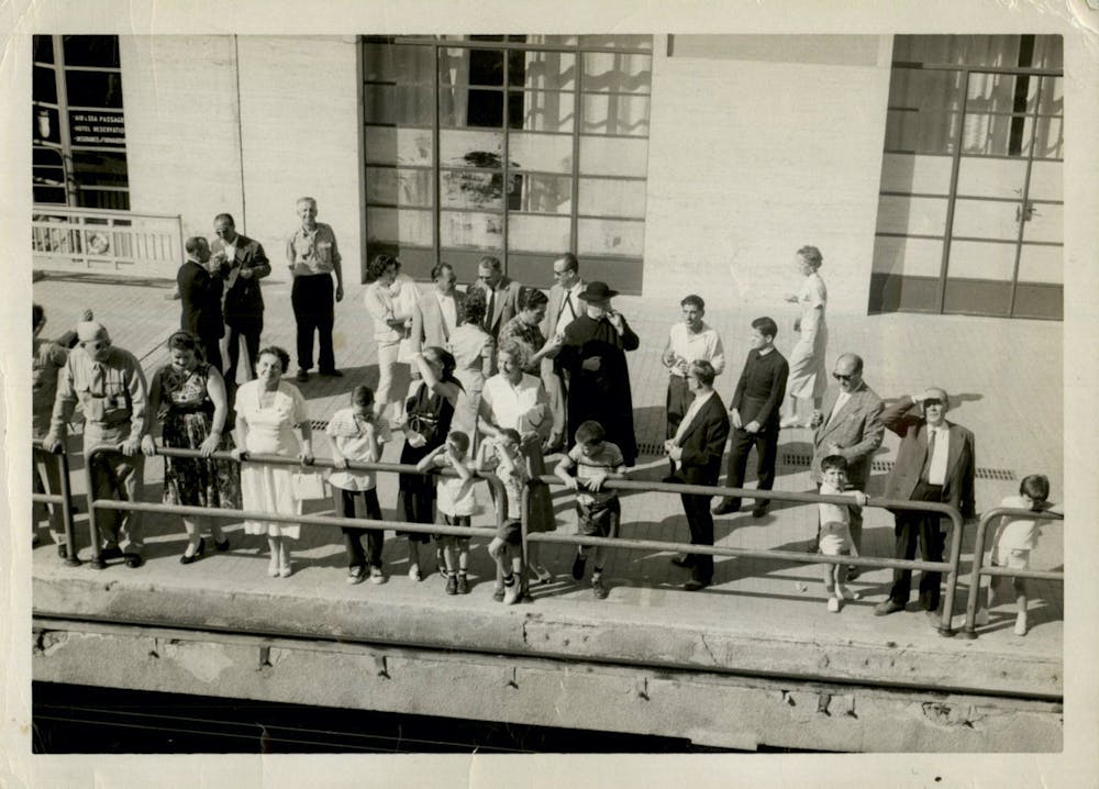 a group of people standing in front of a building