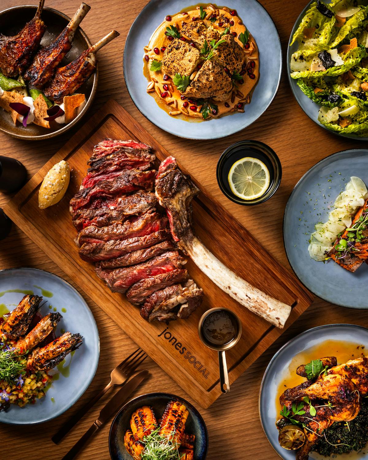 a bowl of food sitting on top of a wooden table