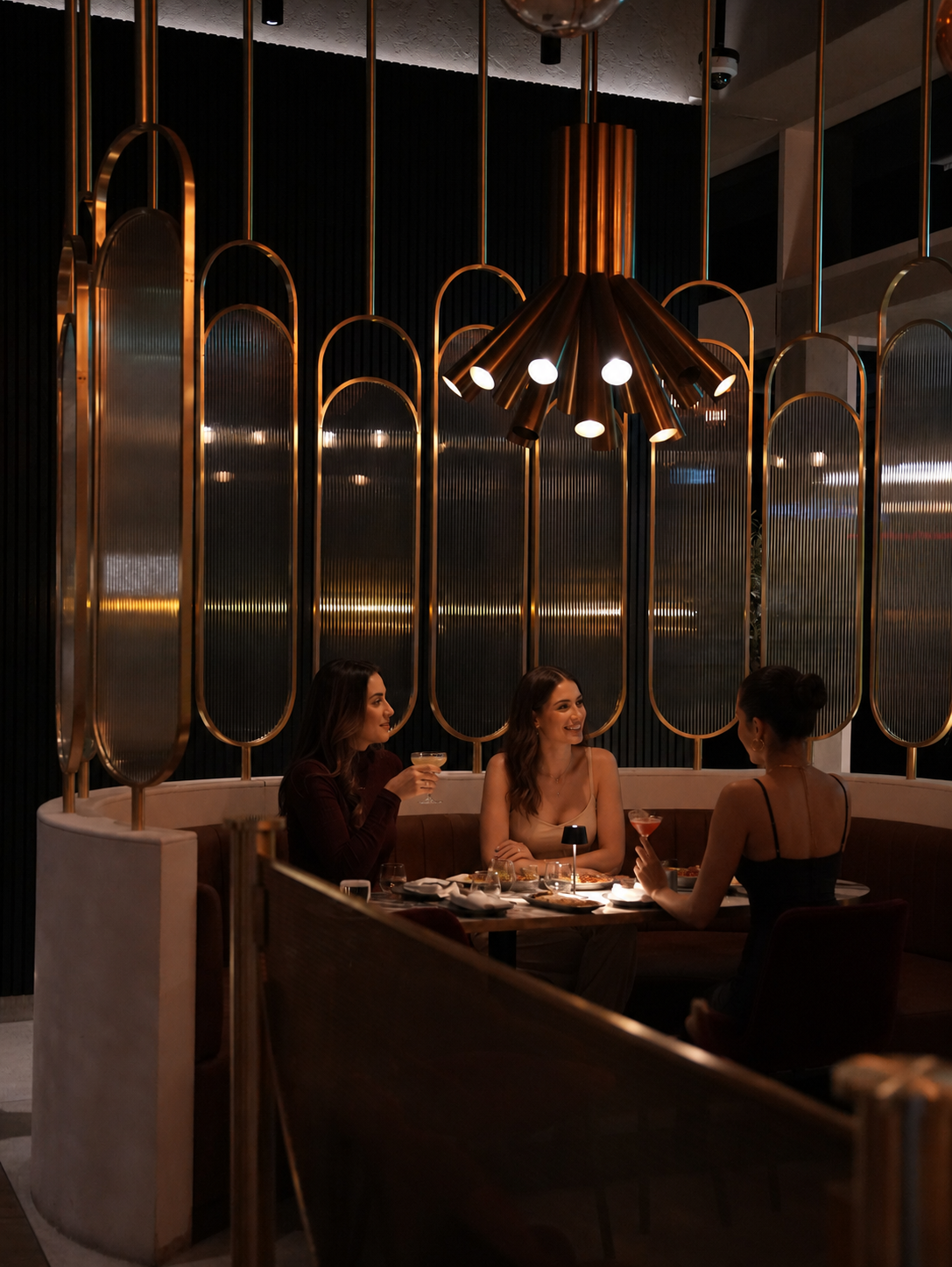 a group of women sitting at a table