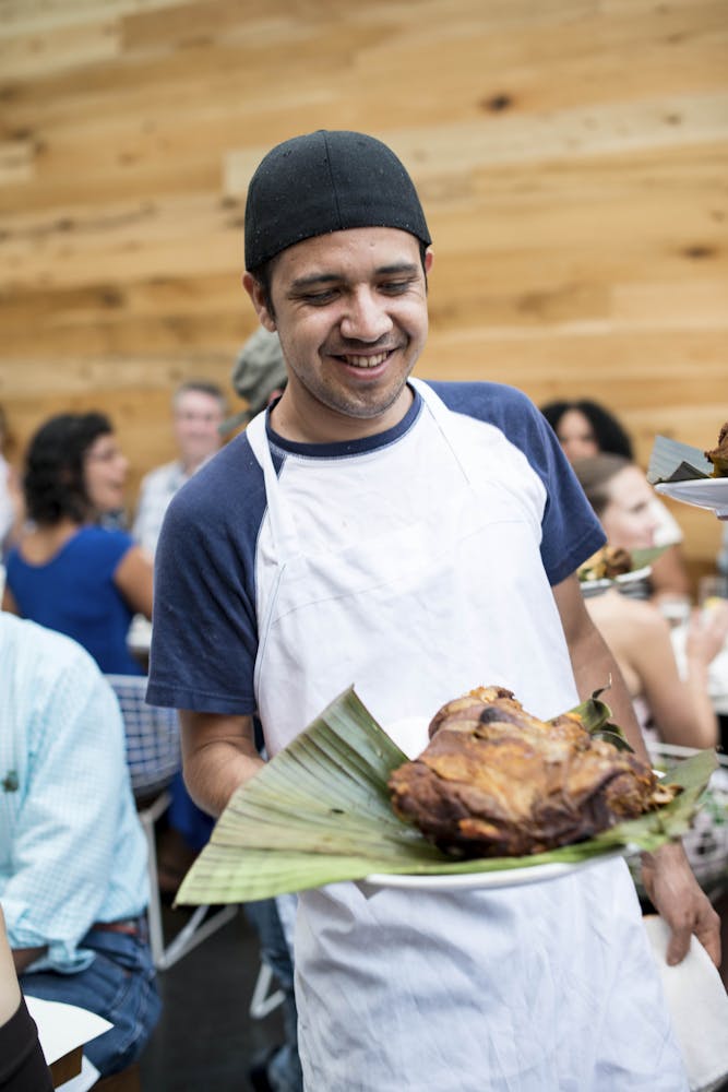 a man holding a plate of food