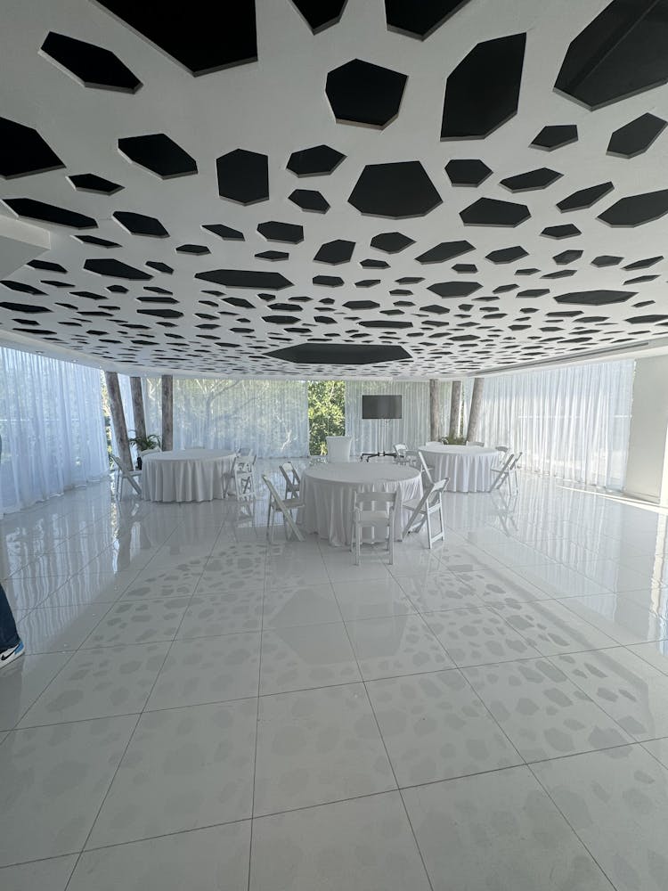a close up of chairs and tables