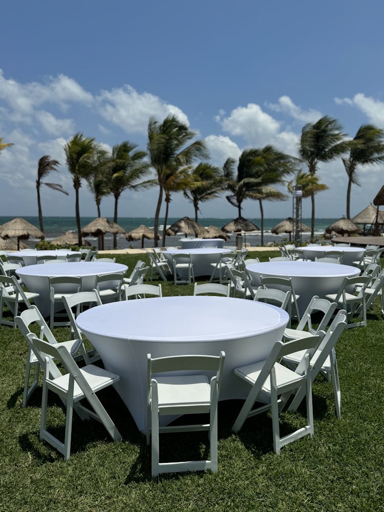a close up of chairs and tables