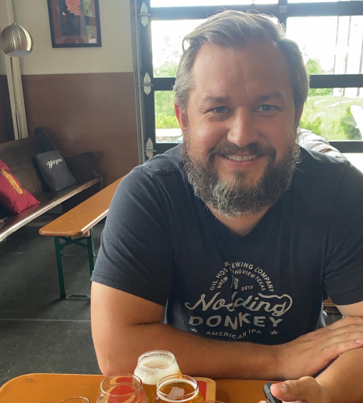 a man sitting at a table eating food