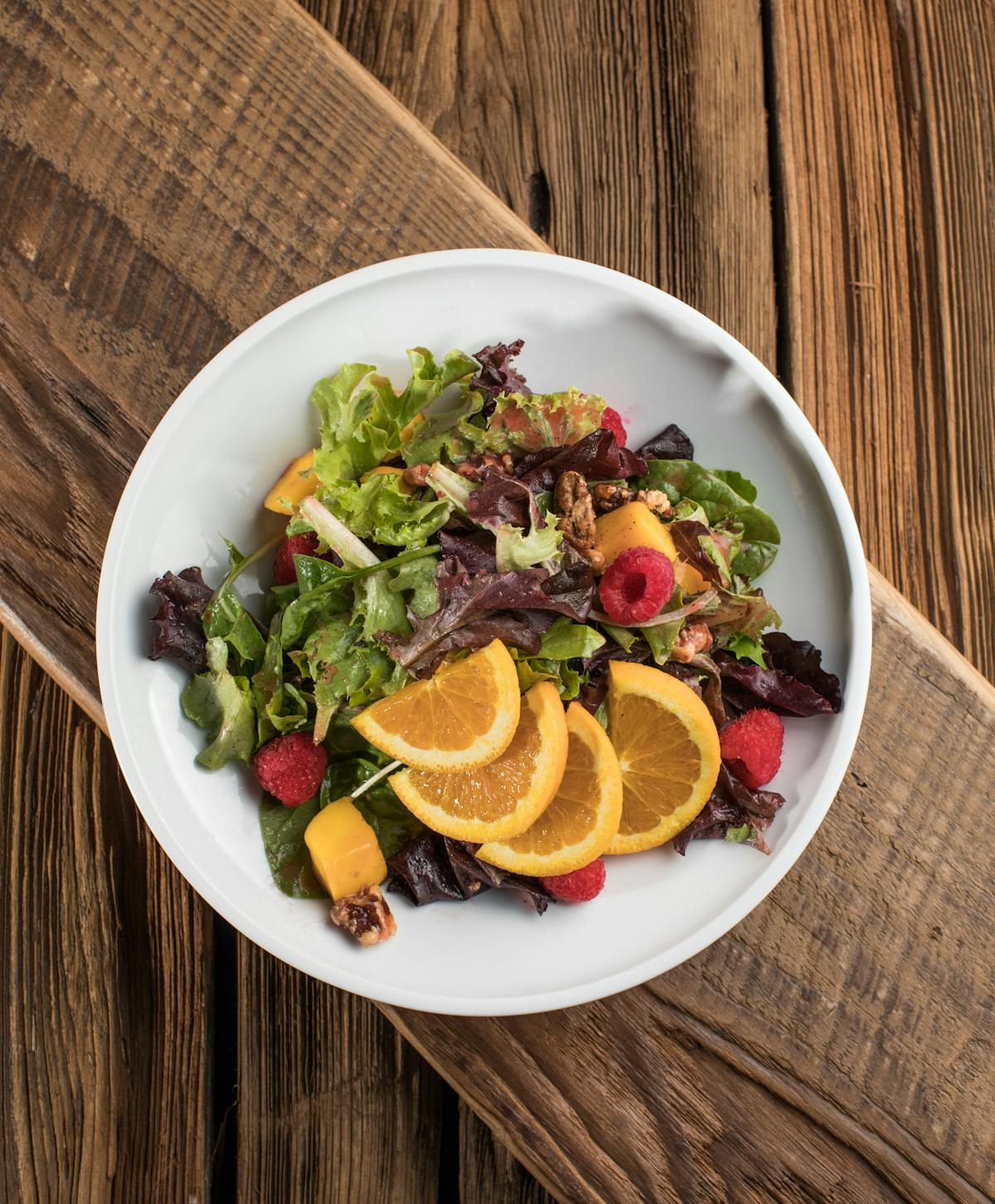 a bowl of salad on a plate