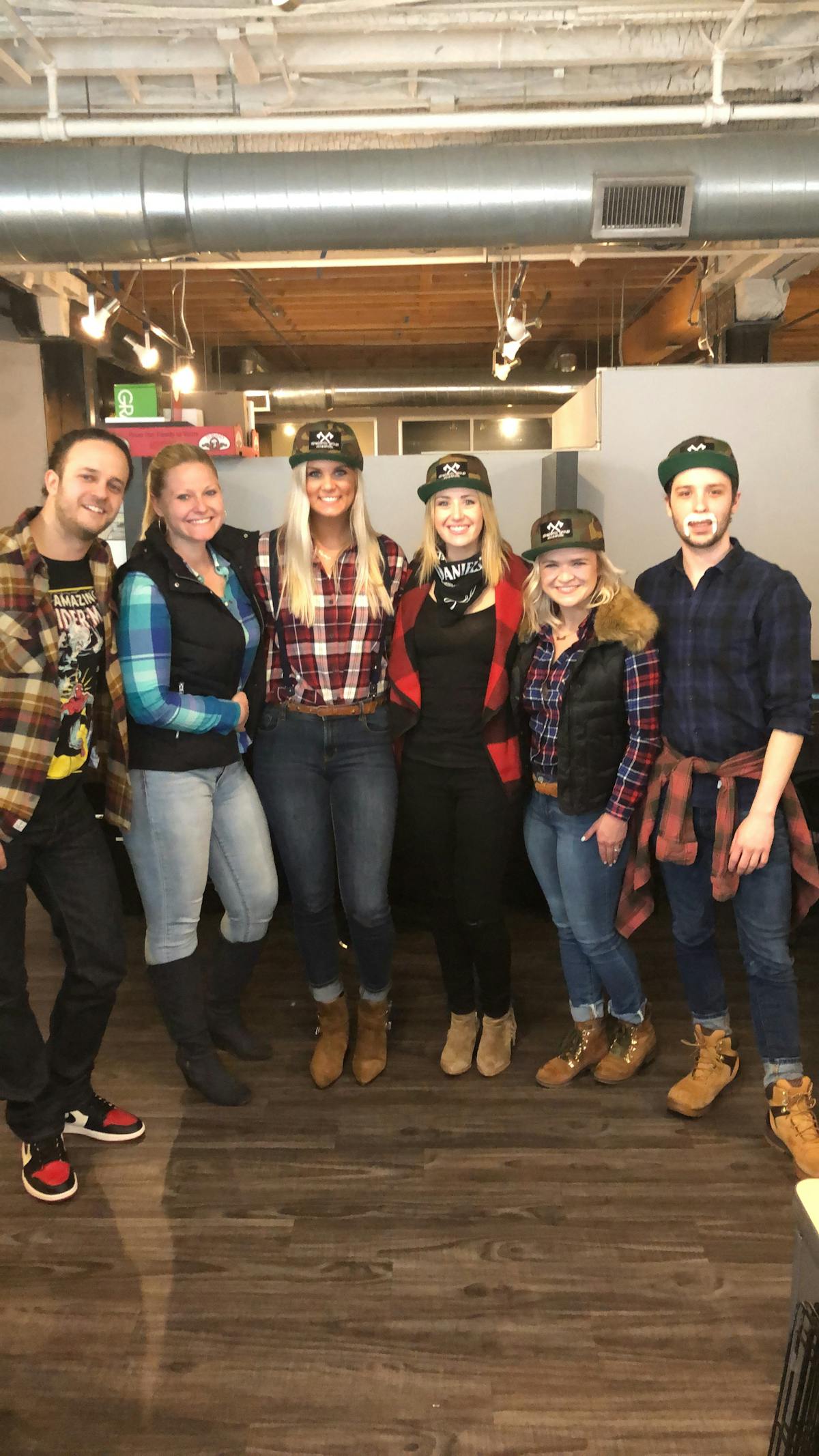 a group of people posing for the camera