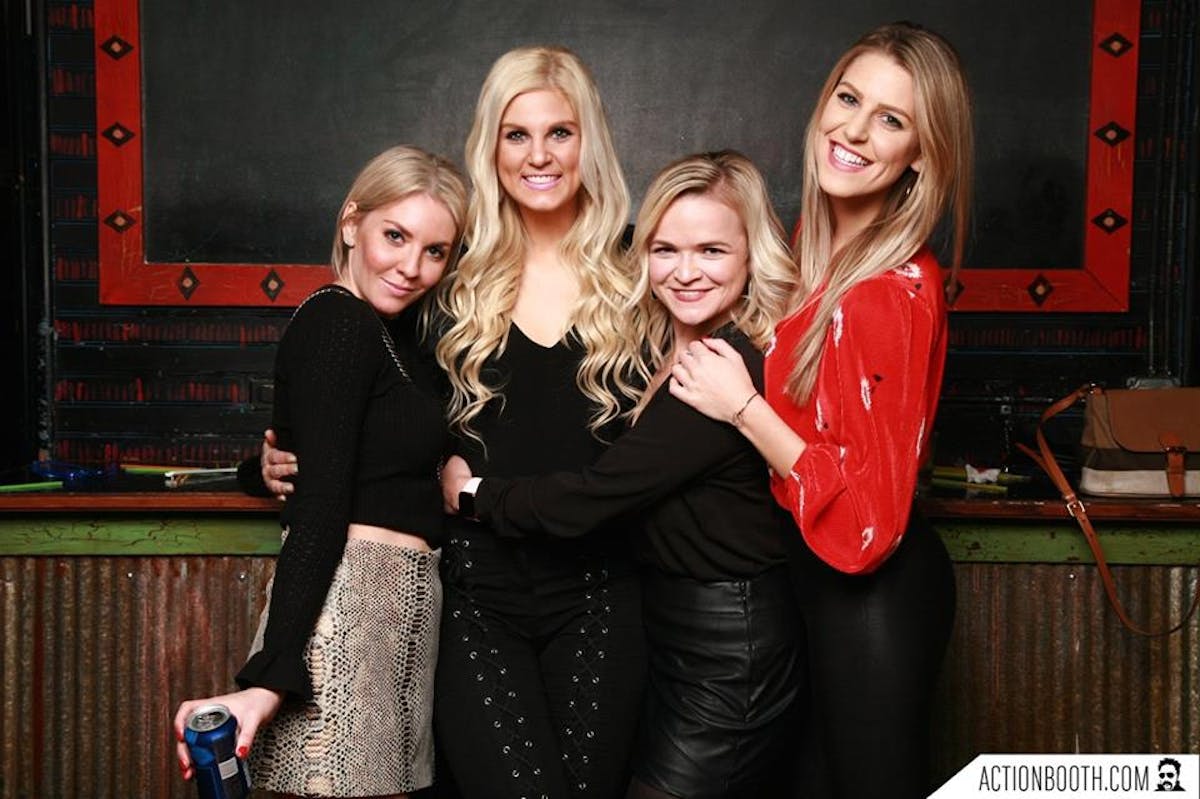 a group of people posing for the camera
