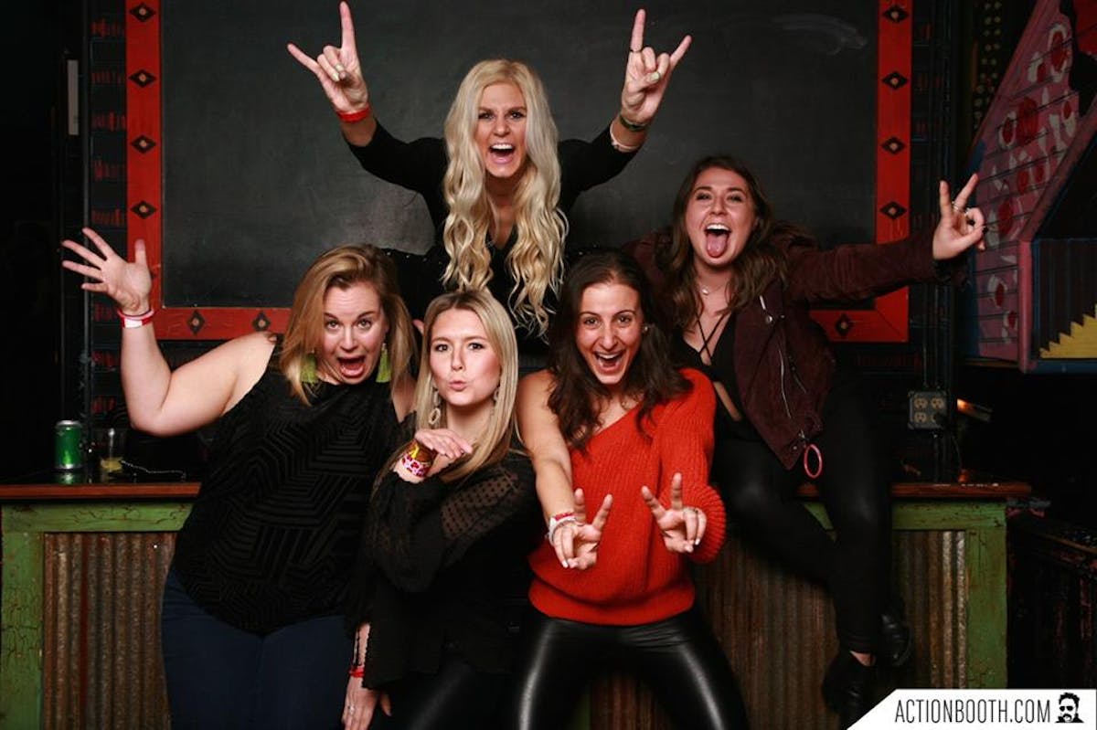 a group of people posing for the camera