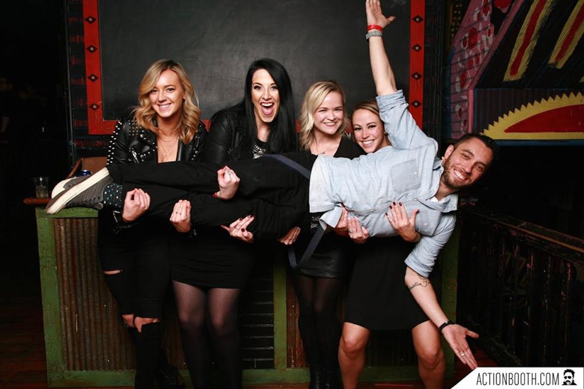 a group of people posing for the camera