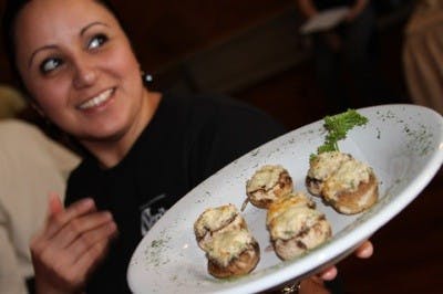 a women holding a plate of food