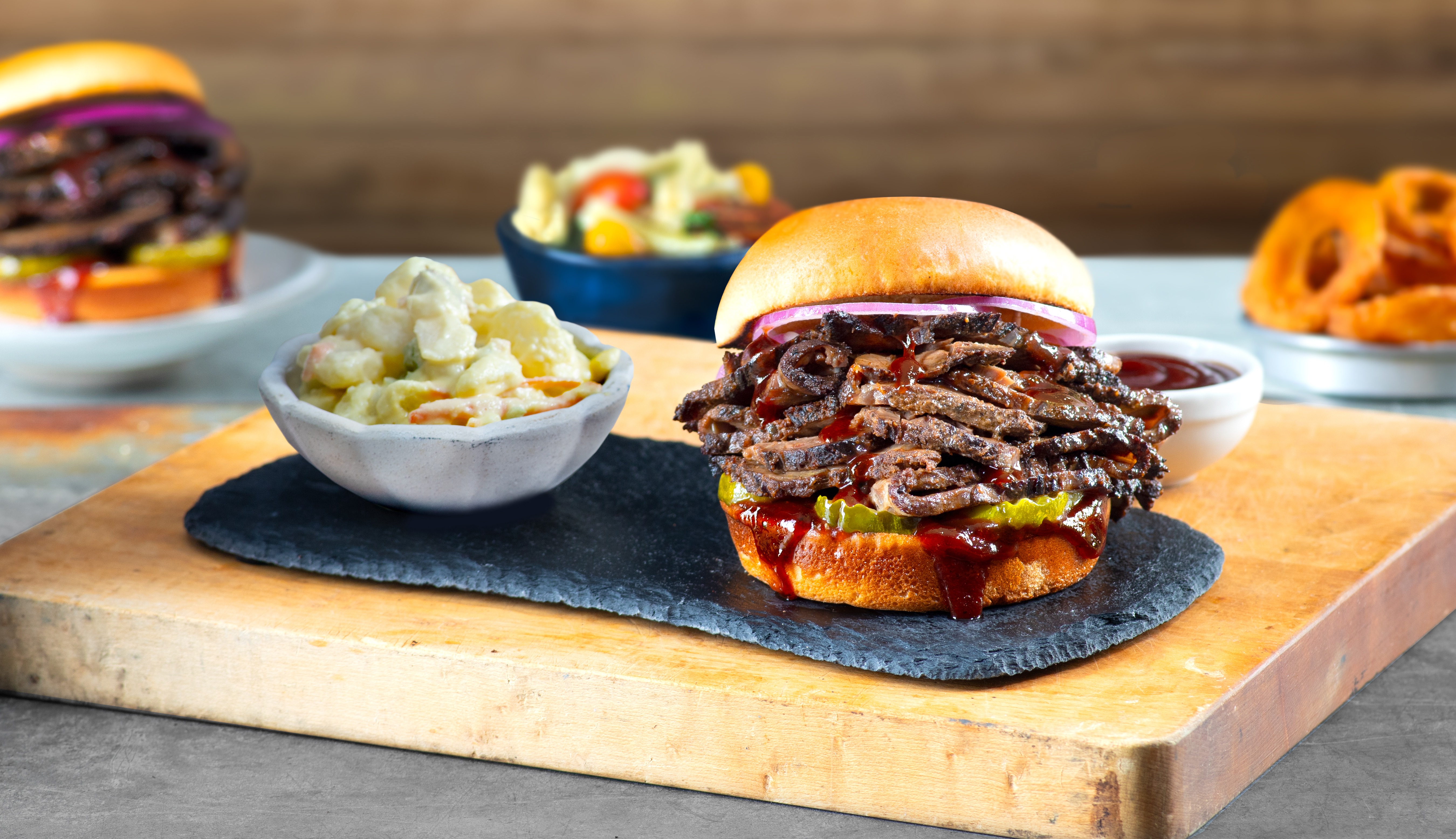 a sandwich sitting on top of a wooden table